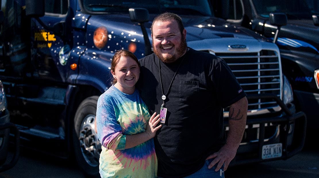 photo of woman and man during team truck driving testimonial interview