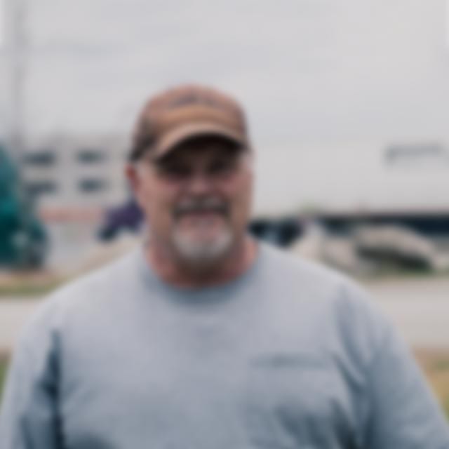 blurred company truck driver